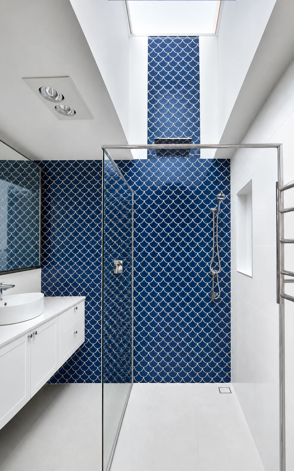 Completed blue tiled skylight shower